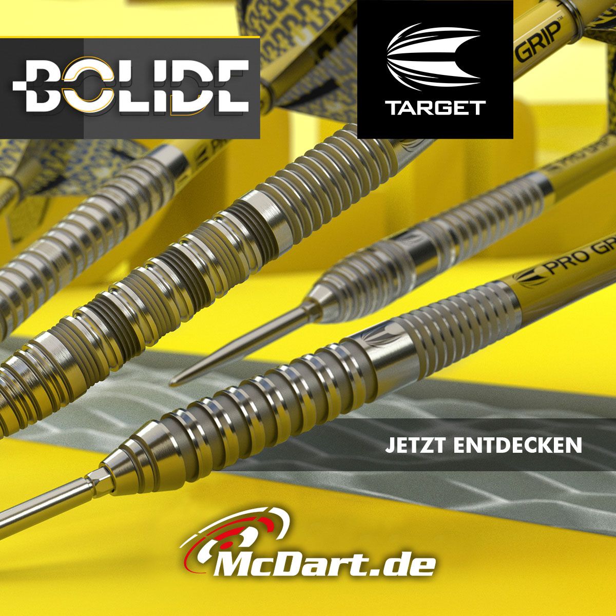 190051_Target_Bolide_Swiss_Point_Steeldarts_admedia1wll2B7kfxvzL Das Bild zeigt die Target Bolide 05 Swiss Point Steeldarts in einer Nahaufnahme, wobei die Details der Pfeile hervorgehoben sind. Im Hintergrund sind die Logos von BOLIDE, TARGET und McDart.de sowie der Text "JETZT ENTDECKEN" zu sehen.
