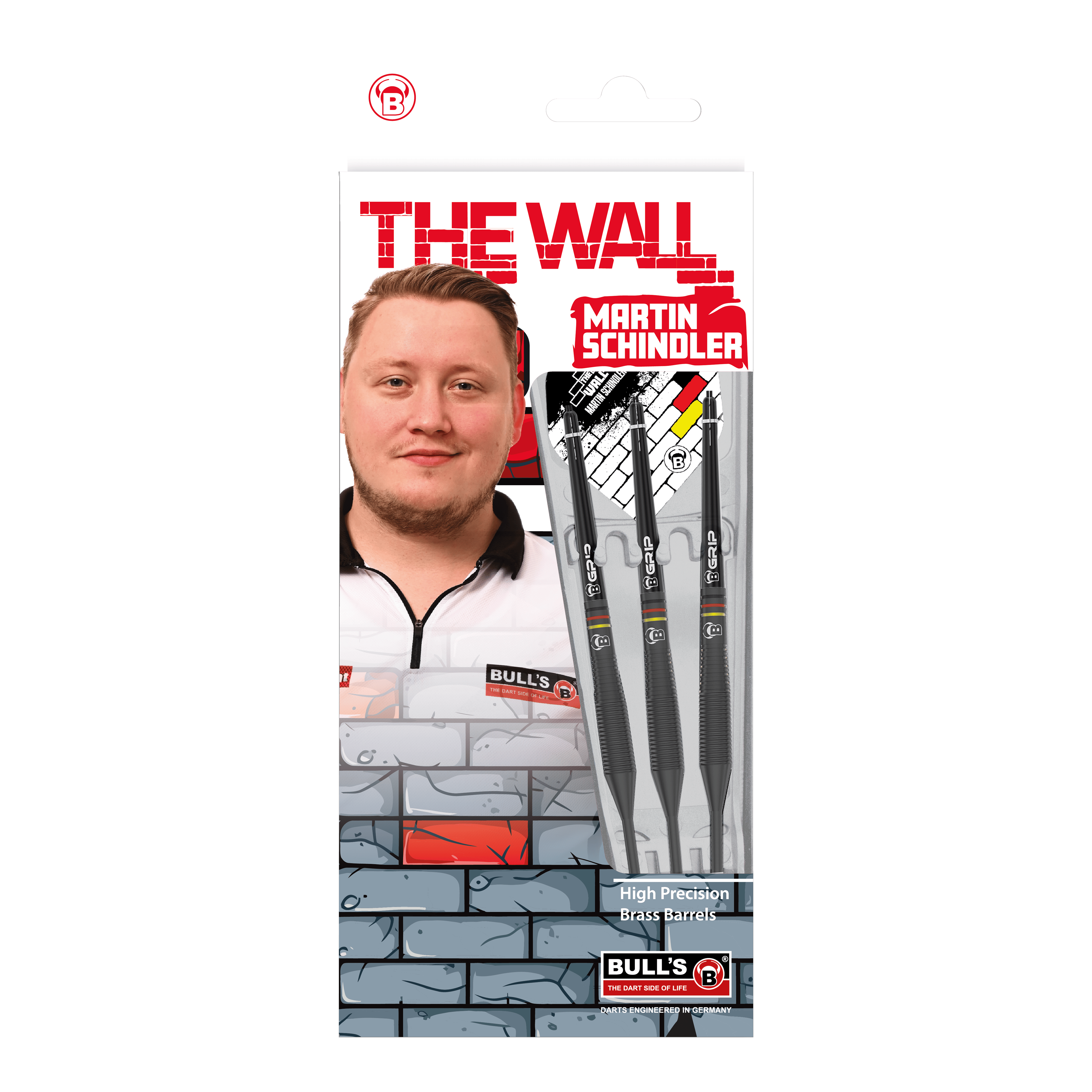 Bulls Martin Schindler The Wall Black Brass Steeldarts Auf dem Bild ist die Verpackung der "Bulls Martin Schindler The Wall Black Brass Steeldarts" zu sehen. Auf der Vorderseite sind das Produkt, ein Porträt von Martin Schindler und das Markenlogo abgebildet.