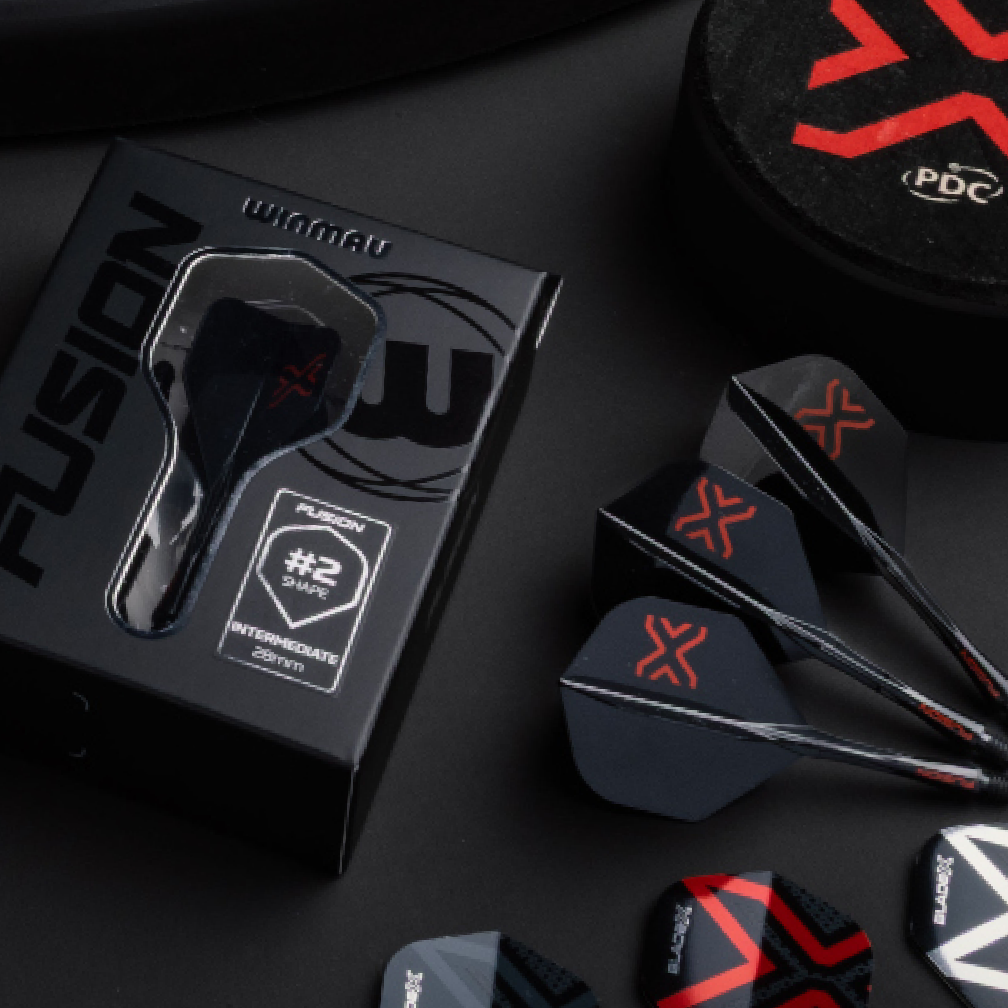 Winmau Fusion Blade X No2 Standard Flight Shaft System - Black Hier sieht man das Winmau Fusion Blade X No2 Standard Flight-Shaft-System in Schwarz. Dieses Produkt kombiniert Flight und Schaft für optimale Performance.