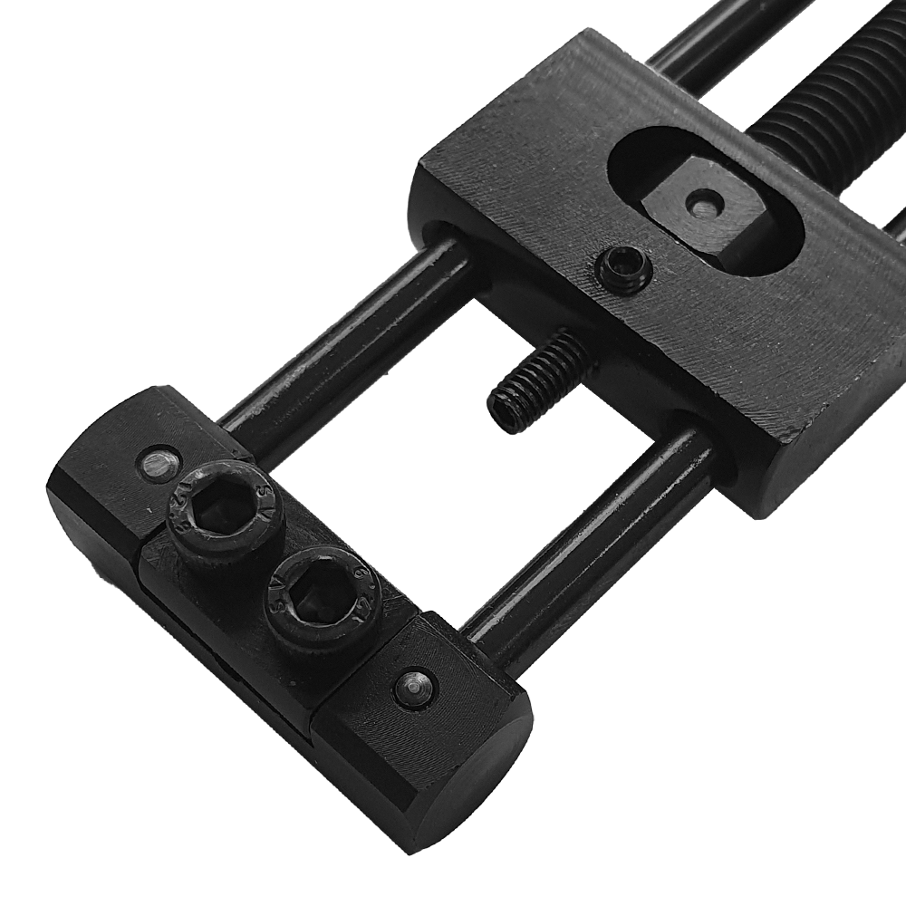 Designa Dart Repointer Black Pro Edition - Tip Changer Designa Dart Repointer Black Pro Edition - Spitzenwechsler ist ein Tool zum Wechseln von Dartspitzen. Das Bild zeigt das Produkt aus schwarzem Material.