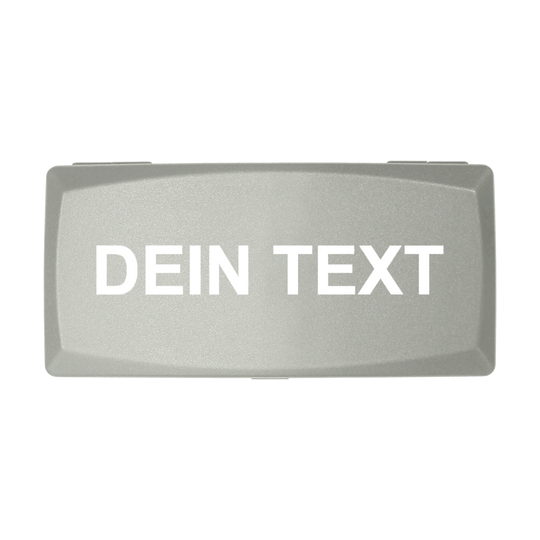 Auf dem Bild ist eine graue Box zu sehen. Auf der Box steht in weißen Buchstaben "DEIN TEXT".