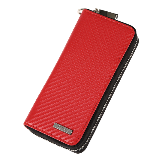 Cameo Business Case Pro3 Das Bild zeigt ein rotes Etui mit einer strukturierten Oberfläche und einem Reißverschluss. An der unteren Ecke befindet sich ein kleines Metallschild mit einer Gravur.