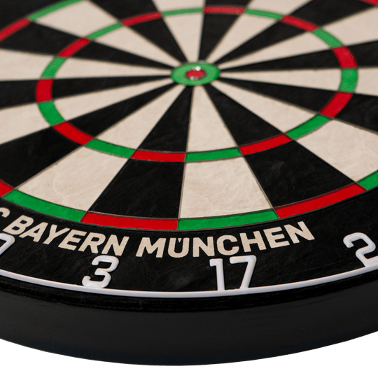 Bulls FC Bayern Munich Bristle steel dartboard Das Bild zeigt das Bulls FC Bayern München Bristle Steeldartboard. Es handelt sich um eine Scheibe zum Dartspielen mit dem Logo des FC Bayern München.