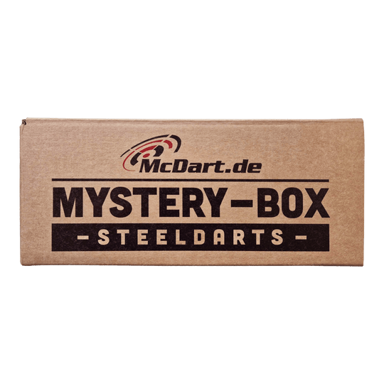 Die Abbildung zeigt eine braune Box mit der Aufschrift „McDart Mystery-Box - Steeldarts“. Die Verpackung sieht einfach aus und ist speziell für Steeldarts-Fans gestaltet.