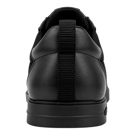 Triple20 Dart Shoes Textile with Twist Closure - Black Zu sehen sind die Triple20 Dartschuhe Textil mit Drehverschluss in schwarzer Farbe. Die Schuhe verfügen über einen speziellen Verschluss.