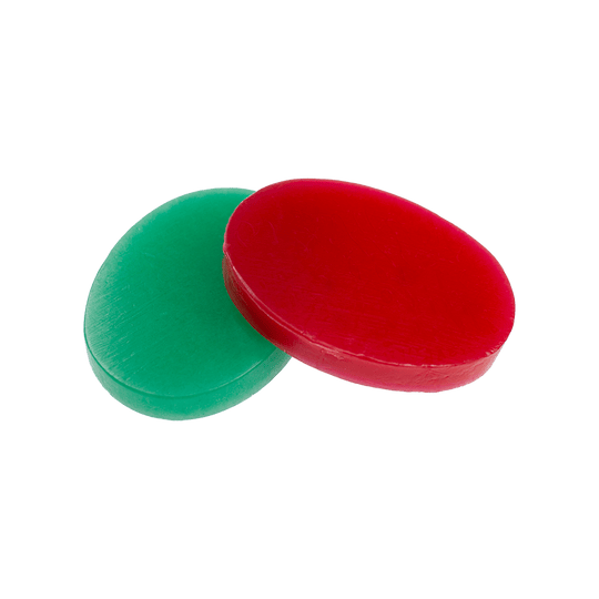 604_Fingerwachs_3 Auf dem Bild sind zwei ovale Wachsplatten in den Farben Rot und Grün zu sehen. Es handelt sich um das Produkt "Fingerwachs".