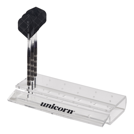 Unicorn Acrylic Dart Stand Das Bild zeigt einen durchsichtigen Acryl-Dartständer der Marke Unicorn. Im Ständer sind drei Dartpfeile ordentlich aufgestellt.
